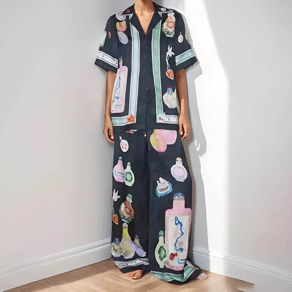 Black women's casual two-piece set with cartoon pattern cardigan and plain trousers