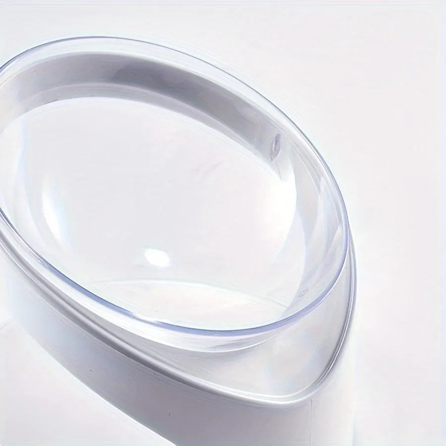 White clear plastic tilted ergonomic cat food bowl for dry and wet food.