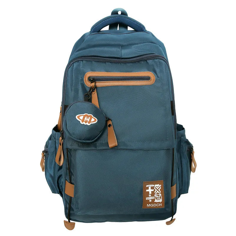 Large black nylon backpack with curved shoulder straps for middle school students