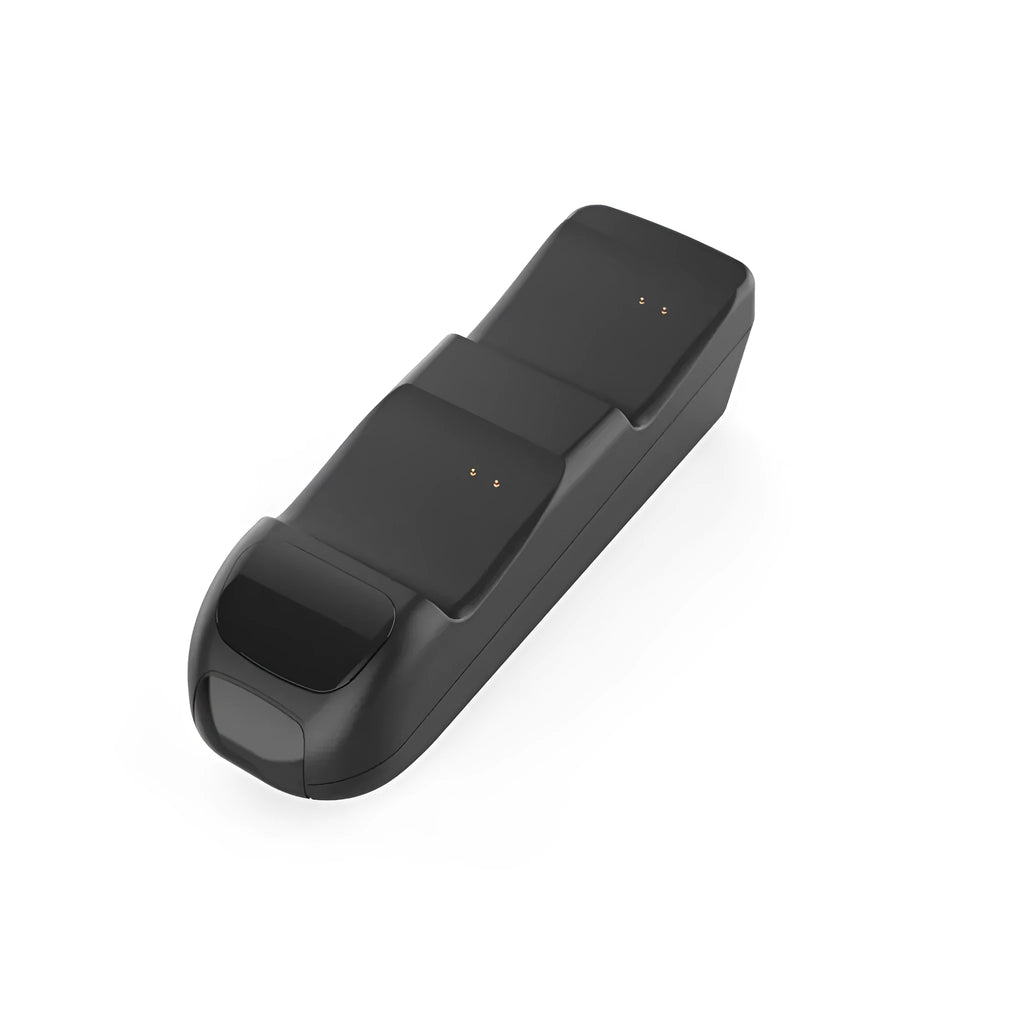 Black Xbox Series X wireless controller charging station showing two controllers docked with LED indicators visible