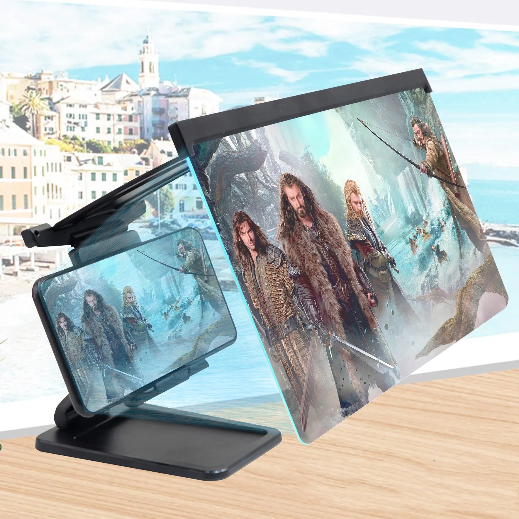 Black L20 split mobile phone screen magnifier with acrylic lens and separate phone bracket on a table.