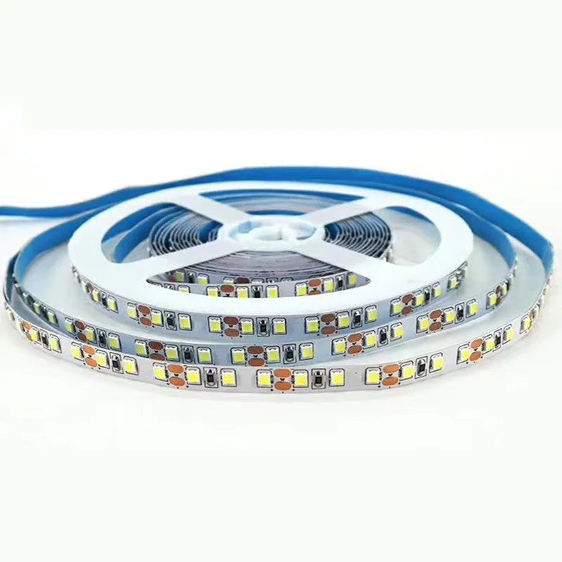 Rectangular patch-style 12V LED light strip mounted under a supermarket shelf for white accent lighting.
