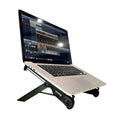 Black folding reinforced nylon portable notebook stand for laptops on a desk