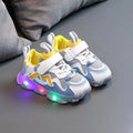 Kids' bright light mesh Velcro sneakers in black, pink, or grey on a rubber sole
