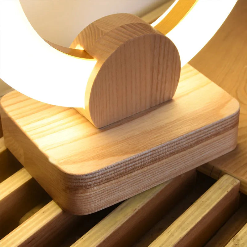 Wooden circular chandelier with acrylic shade in Nordic style for living room illumination