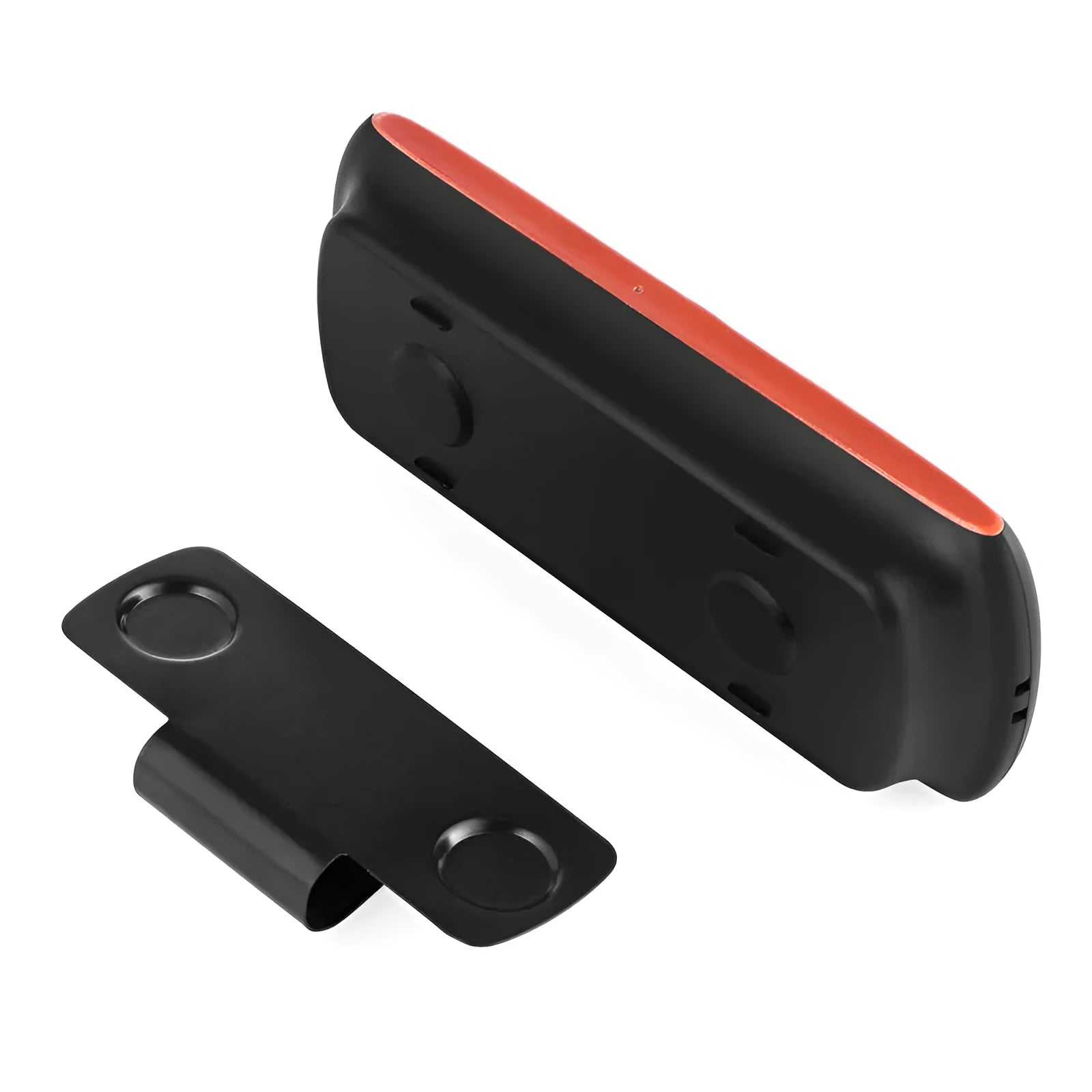 Orange plastic Bluetooth car hands-free speaker mounted on vehicle sun visor
