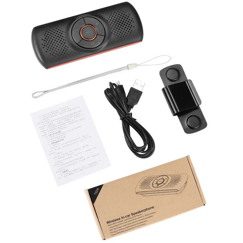 Orange plastic Bluetooth car hands-free speaker mounted on vehicle sun visor