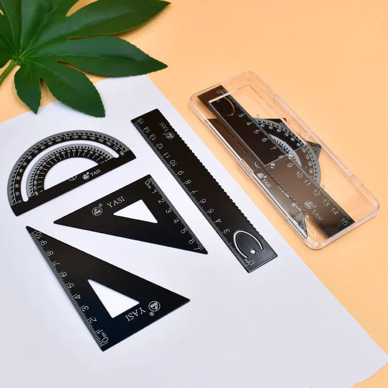 Fraction teaching aids set with magnetic blocks, transparent rulers, and activity corners on a desk.