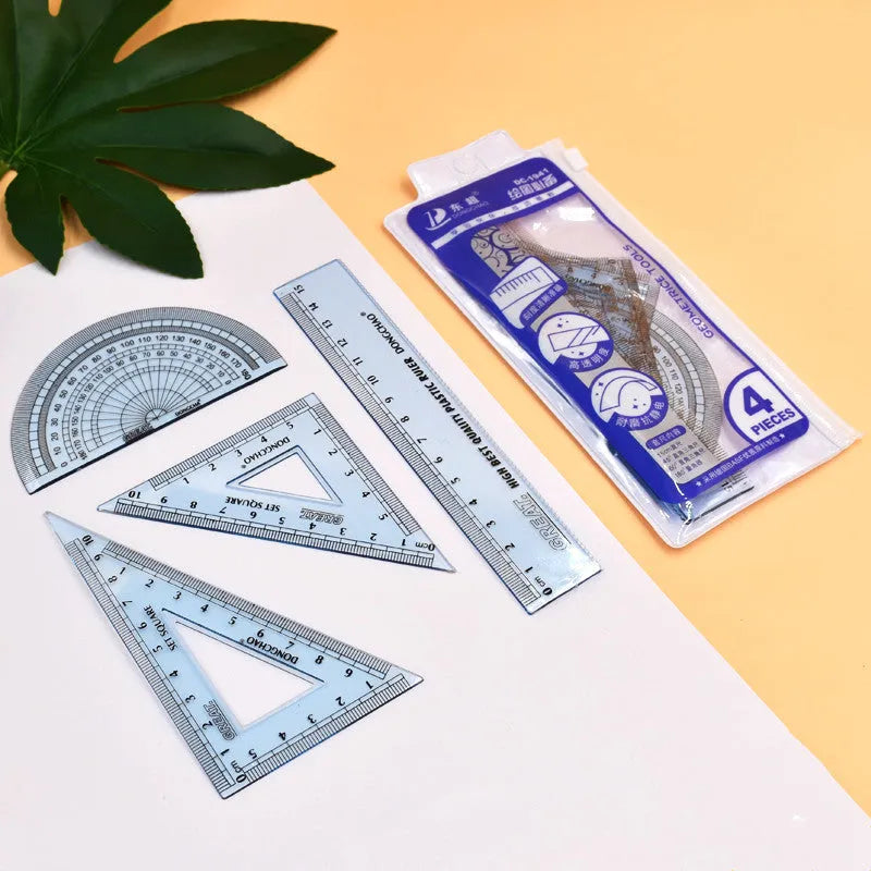 Fraction teaching aids set with magnetic blocks, transparent rulers, and activity corners on a desk.