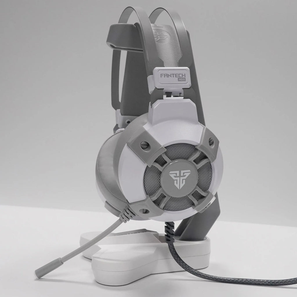 Black FANTECH HG11 USB gaming headset with RGB lights on the earcups and a 2.1m cable with inline remote.