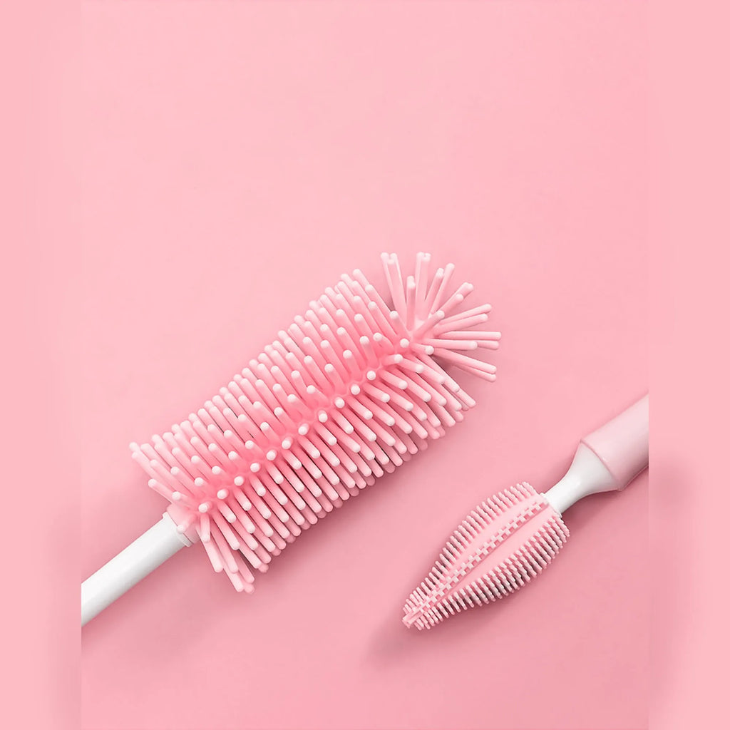 Silicone baby bottle brush set with straw cleaning brush in pink, blue, and yellow colours