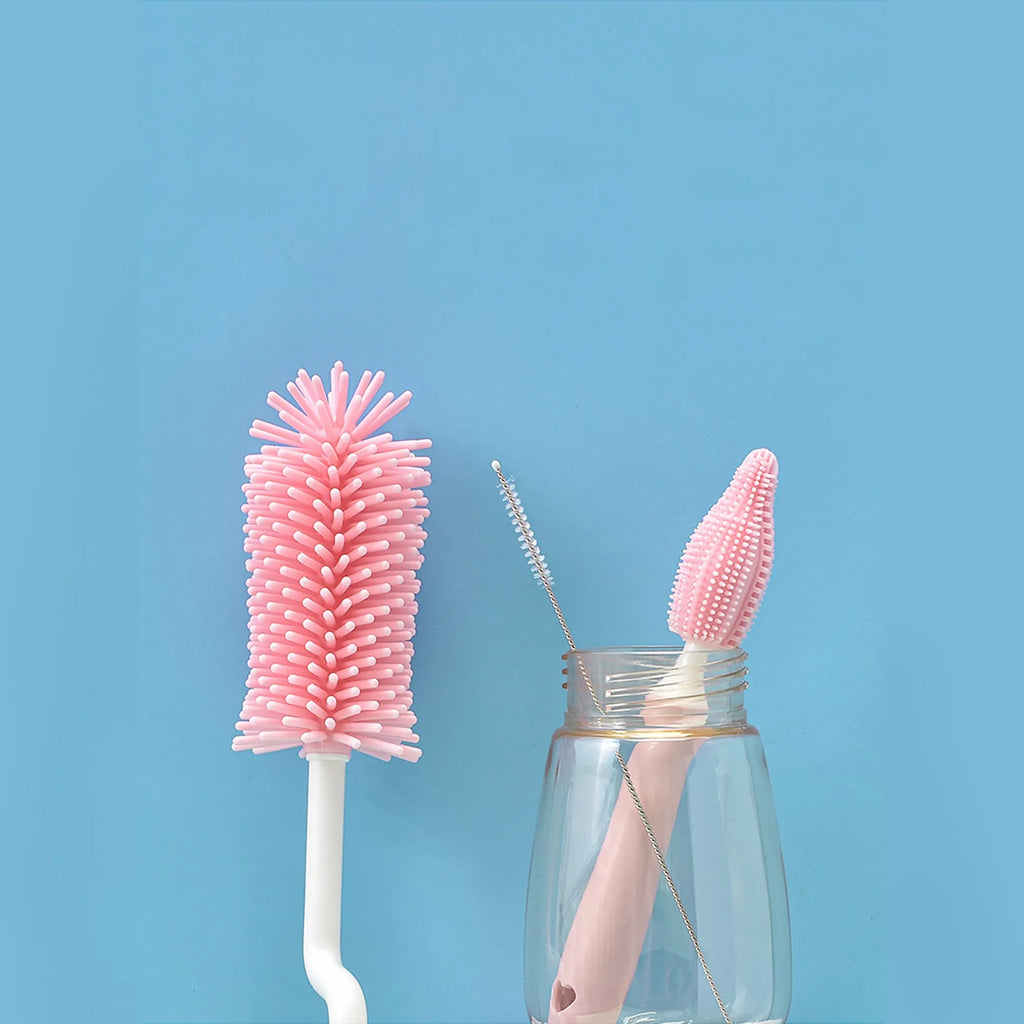 Silicone baby bottle brush set with straw cleaning brush in pink, blue, and yellow colours