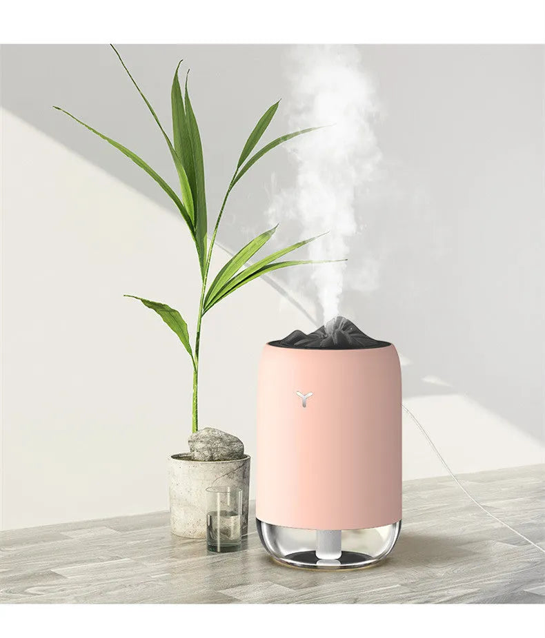 Magic flame ultrasonic humidifier columnar design in white, blue, or pink colours with USB connection
