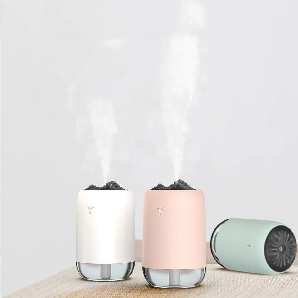 Magic flame ultrasonic humidifier columnar design in white, blue, or pink colours with USB connection