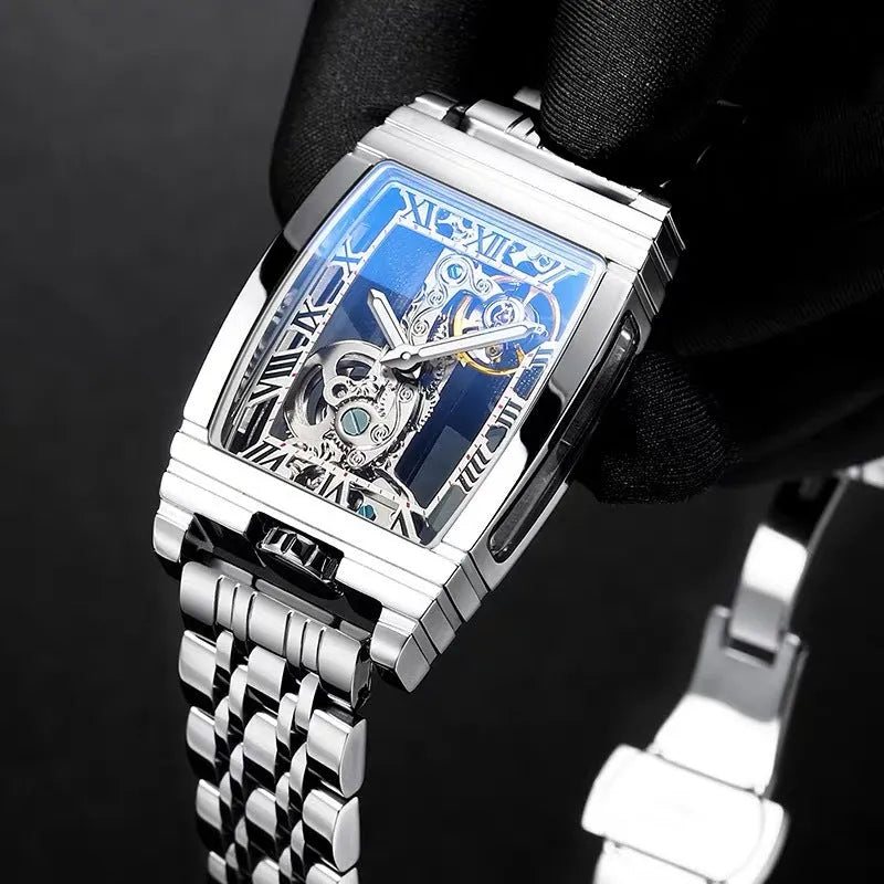 Daystar stainless steel square watch with mechanical movement on a leather strap.