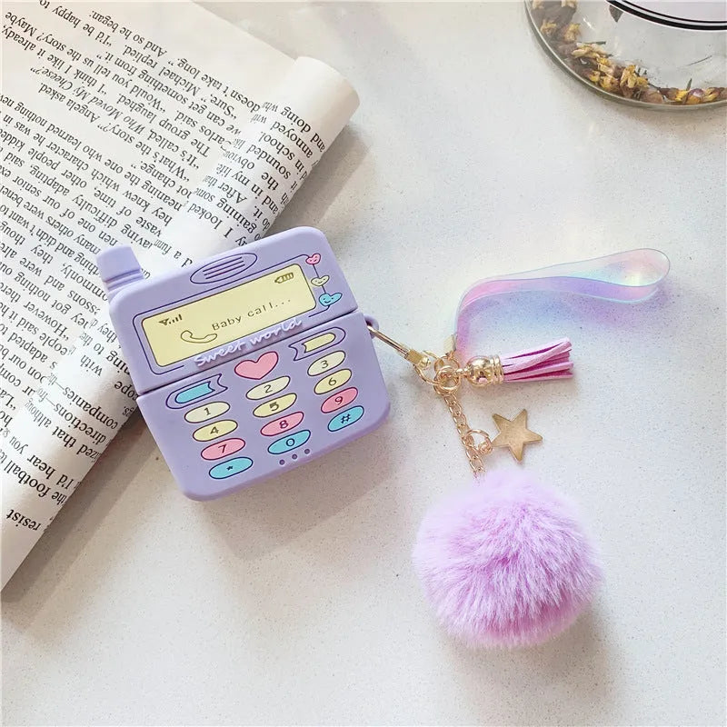 Purple silicone protective case with a fur ball pendant for Apple AirPods Pro and AirPods 1 and 2.