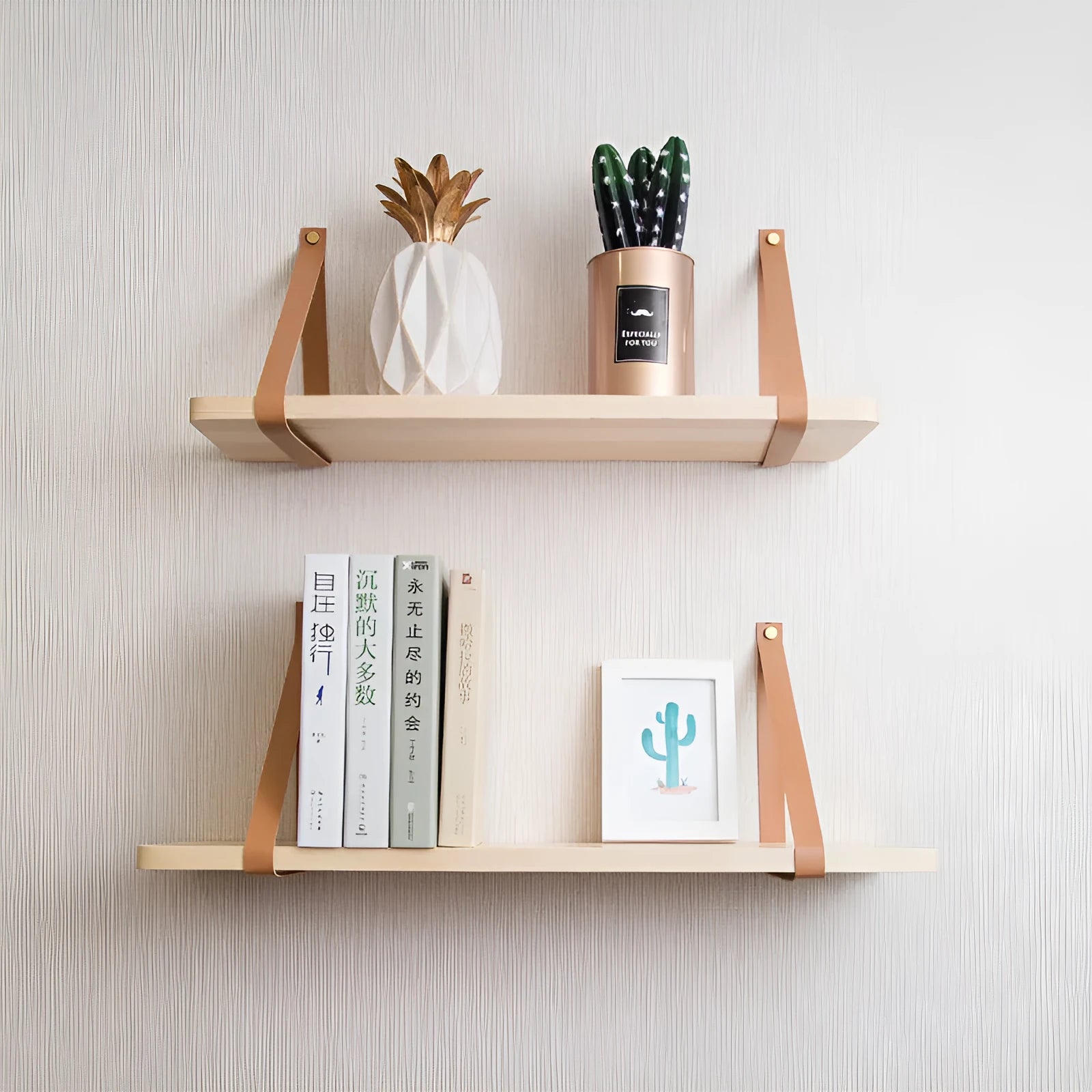 Nordic style pine wood wall shelf measuring 50cm wide, holding remote controls and books