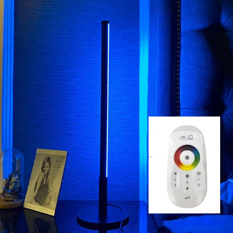 Nordic minimalist black bedside lamp with remote control on wooden nightstand