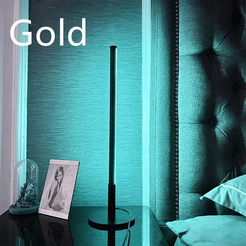 Nordic minimalist black bedside lamp with remote control on wooden nightstand