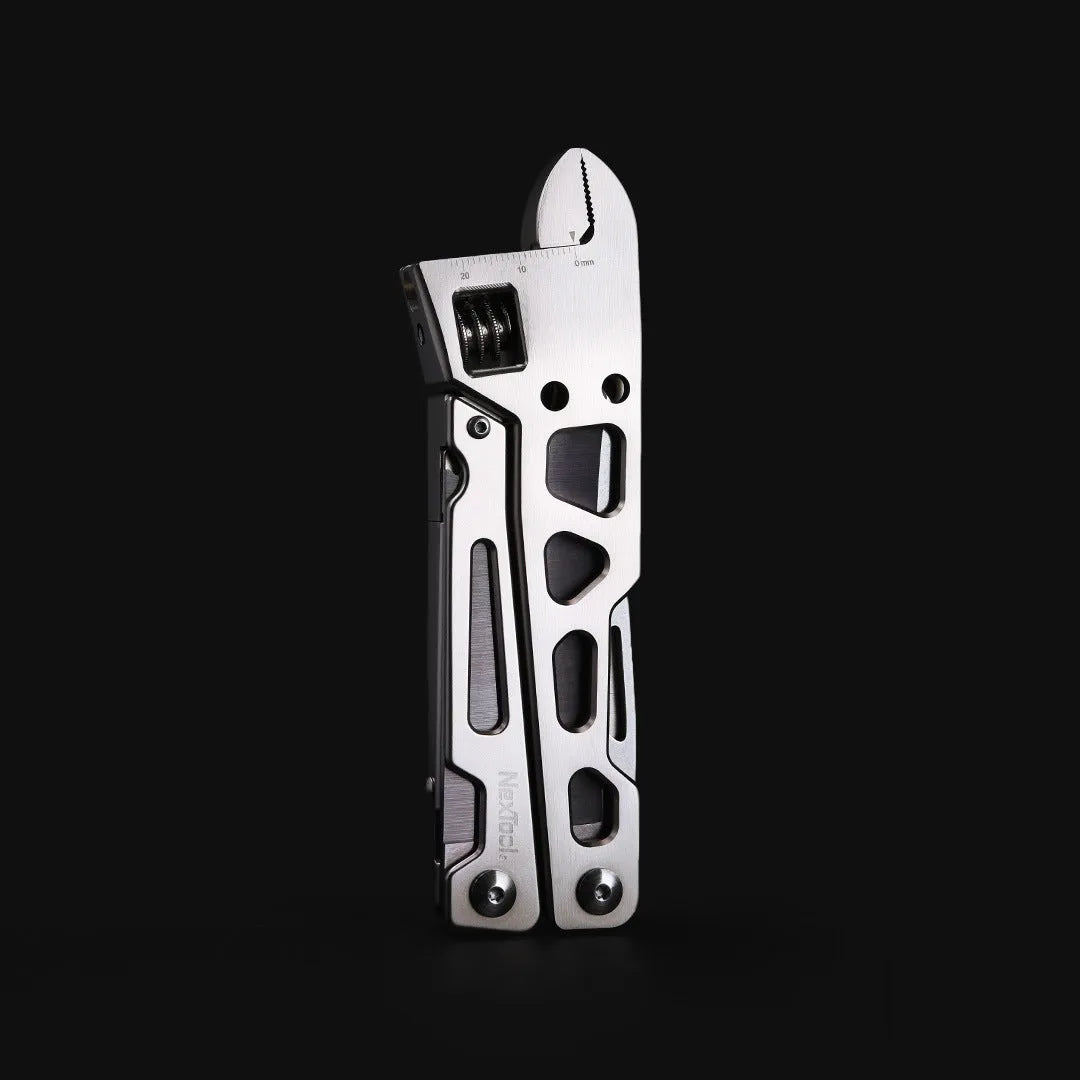 White stainless steel multi-function tool showing wrench, knife blade, and needle nose pliers