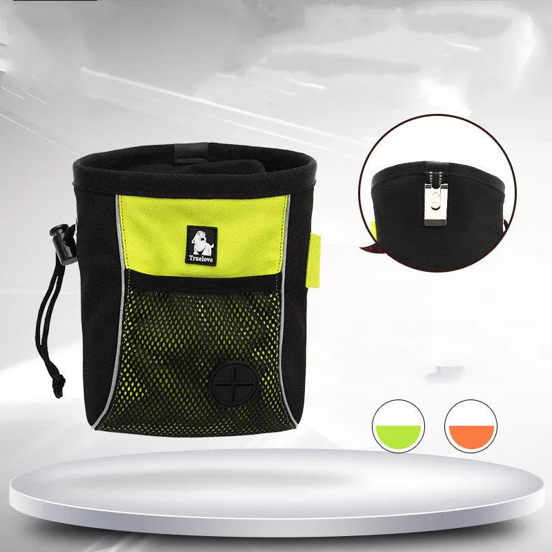 Green waterproof dog training waist bag with a removable waste bag compartment, shown on a person's waist.