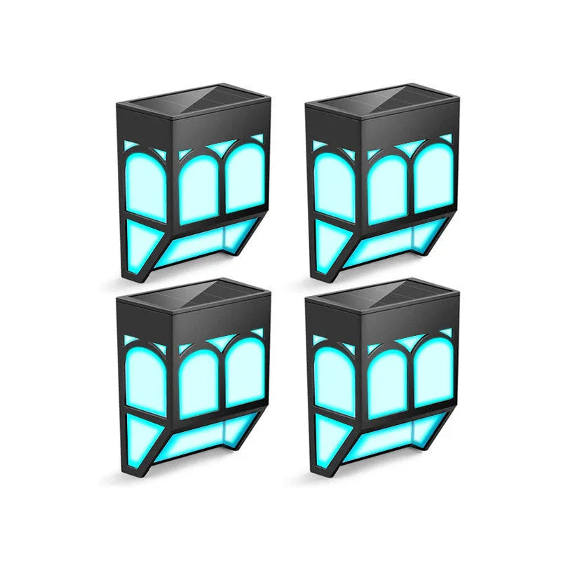Square white solar-powered outdoor wall lamp with LED light, mounted on a fence post.
