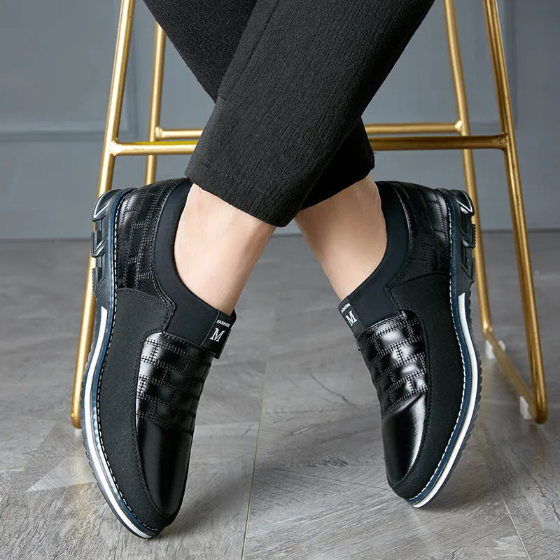 Men's black leather casual low-top shoes shown from the side