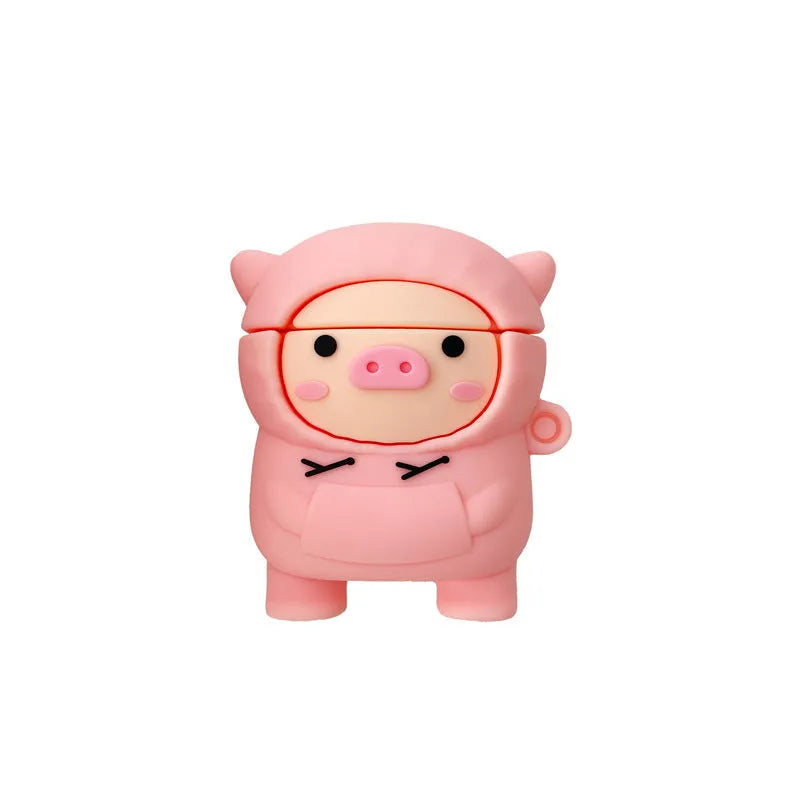 Soft pink silicone AirPods case cover with a cartoon pig graphic and a matching metal carry hook.