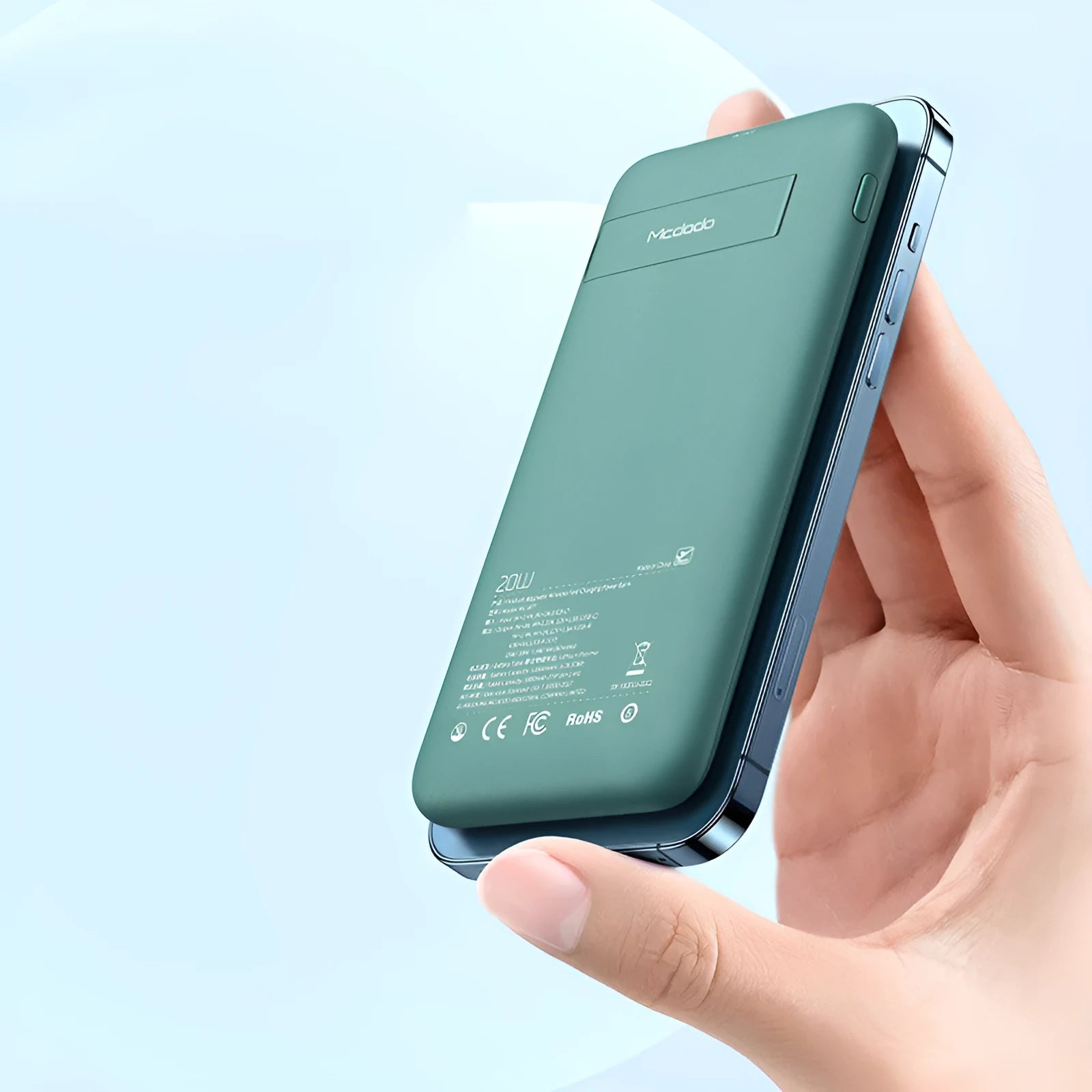 Mint green magnetic wireless power bank with back clip showing MagSafe charging surface