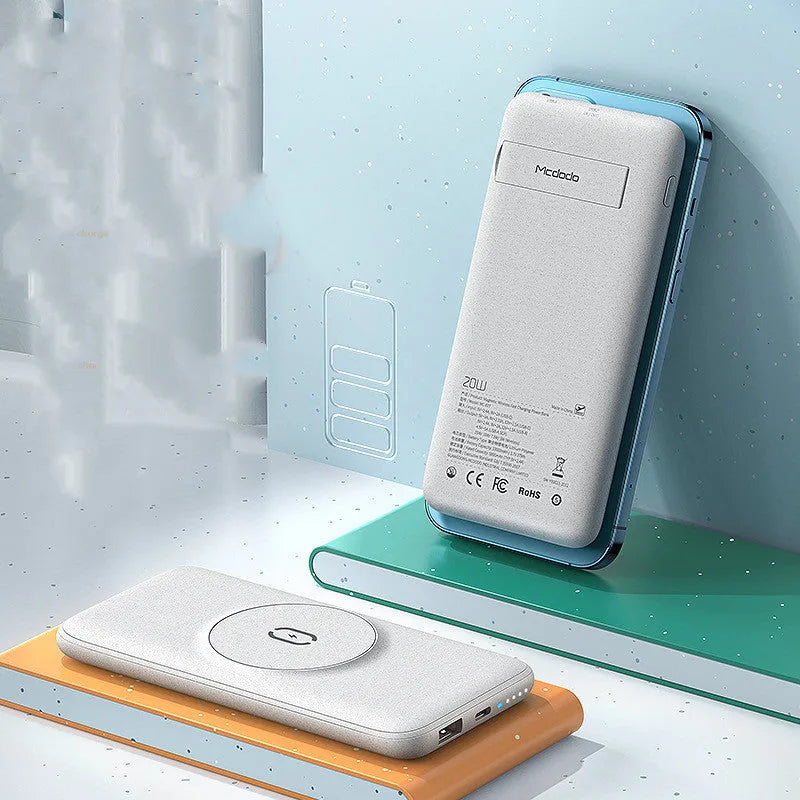 Mint green magnetic wireless power bank with back clip showing MagSafe charging surface