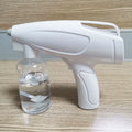 White handheld wireless electric disinfection spray gun with USB charging cable
