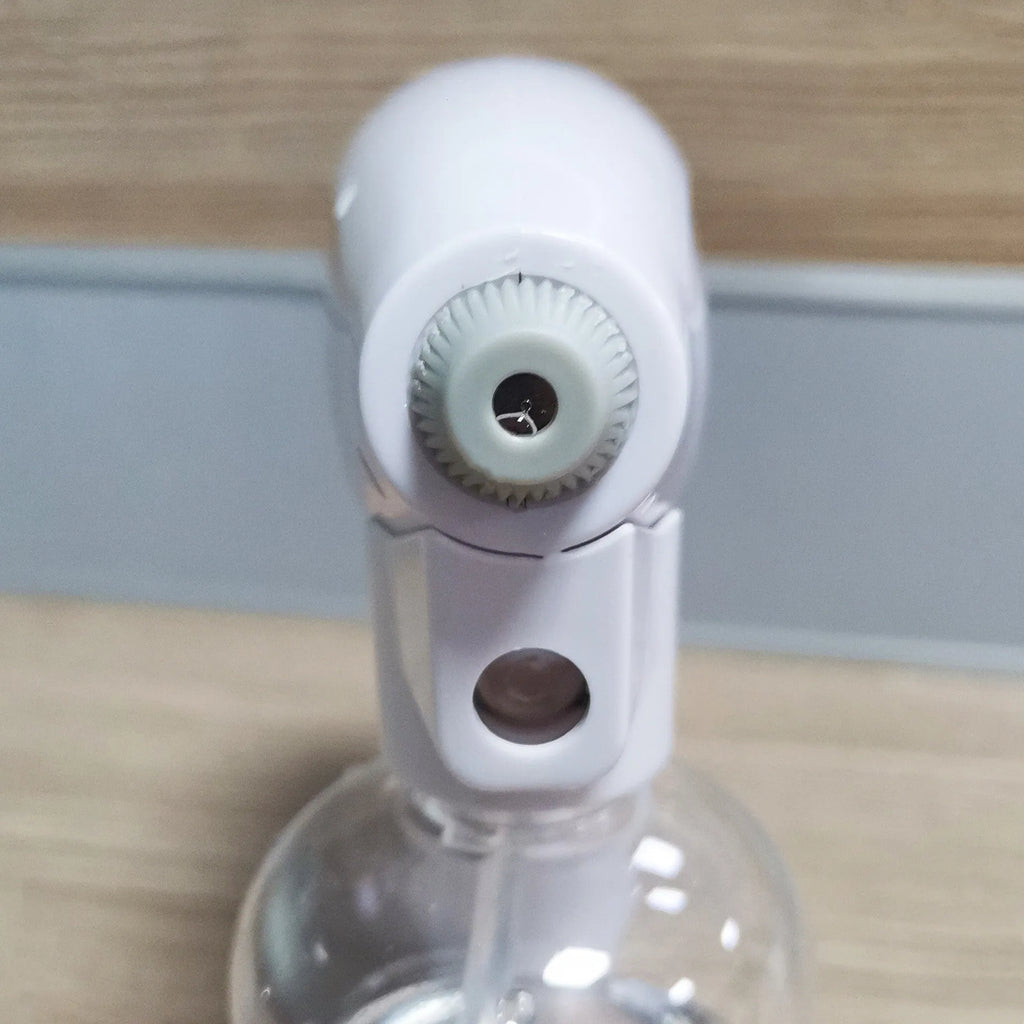 White handheld wireless electric disinfection spray gun with USB charging cable