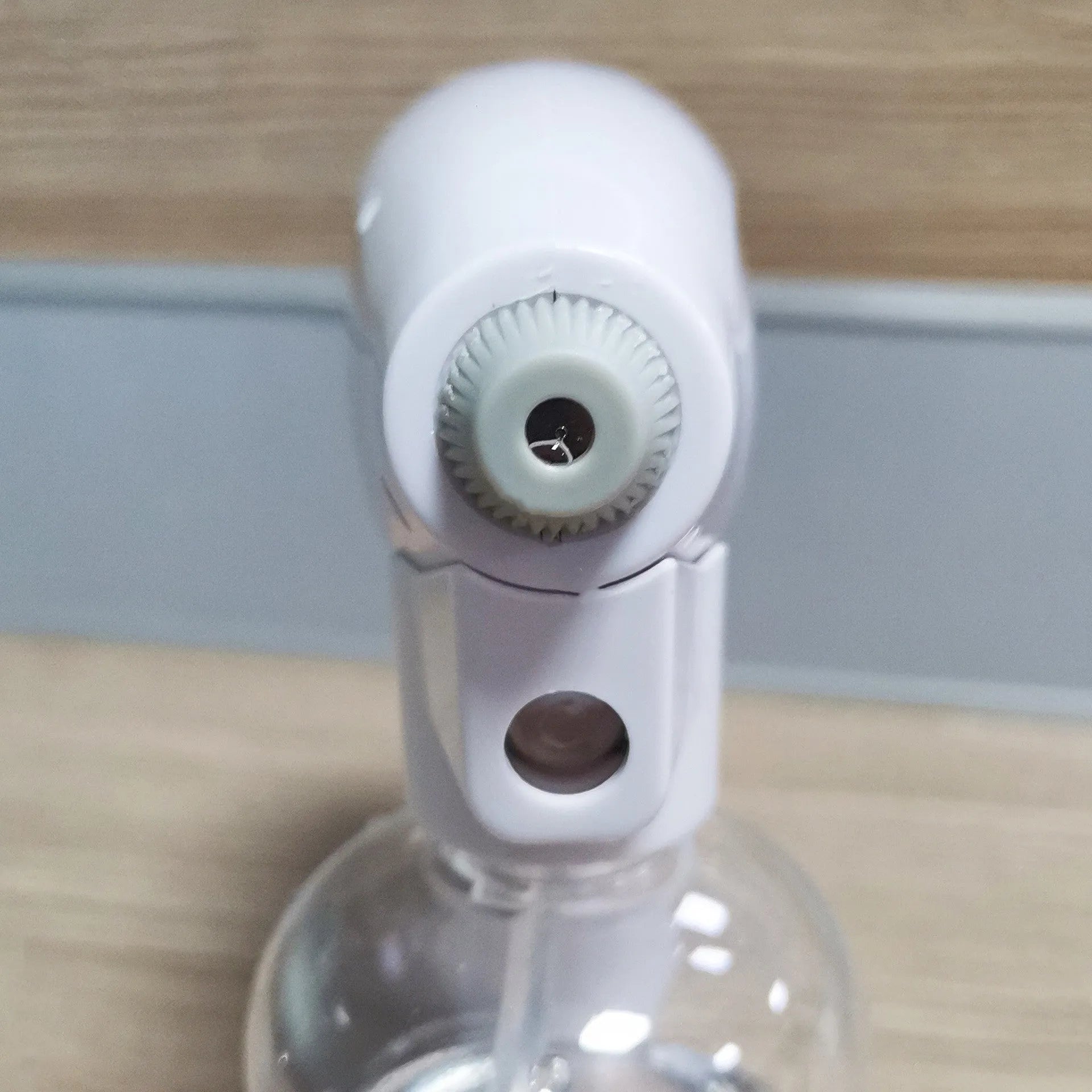 White handheld wireless electric disinfection spray gun with USB charging cable