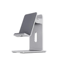Alloy metal desktop stand holding a mobile phone, shown in dark space grey and streaming silver colours.