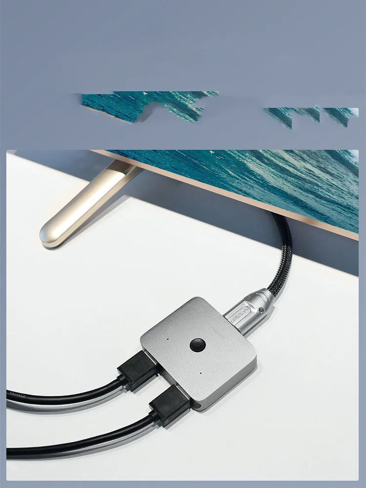 Grey Haibeisi HDMI splitter switcher with 1 input and 2 output ports for computer TV monitor video sharing