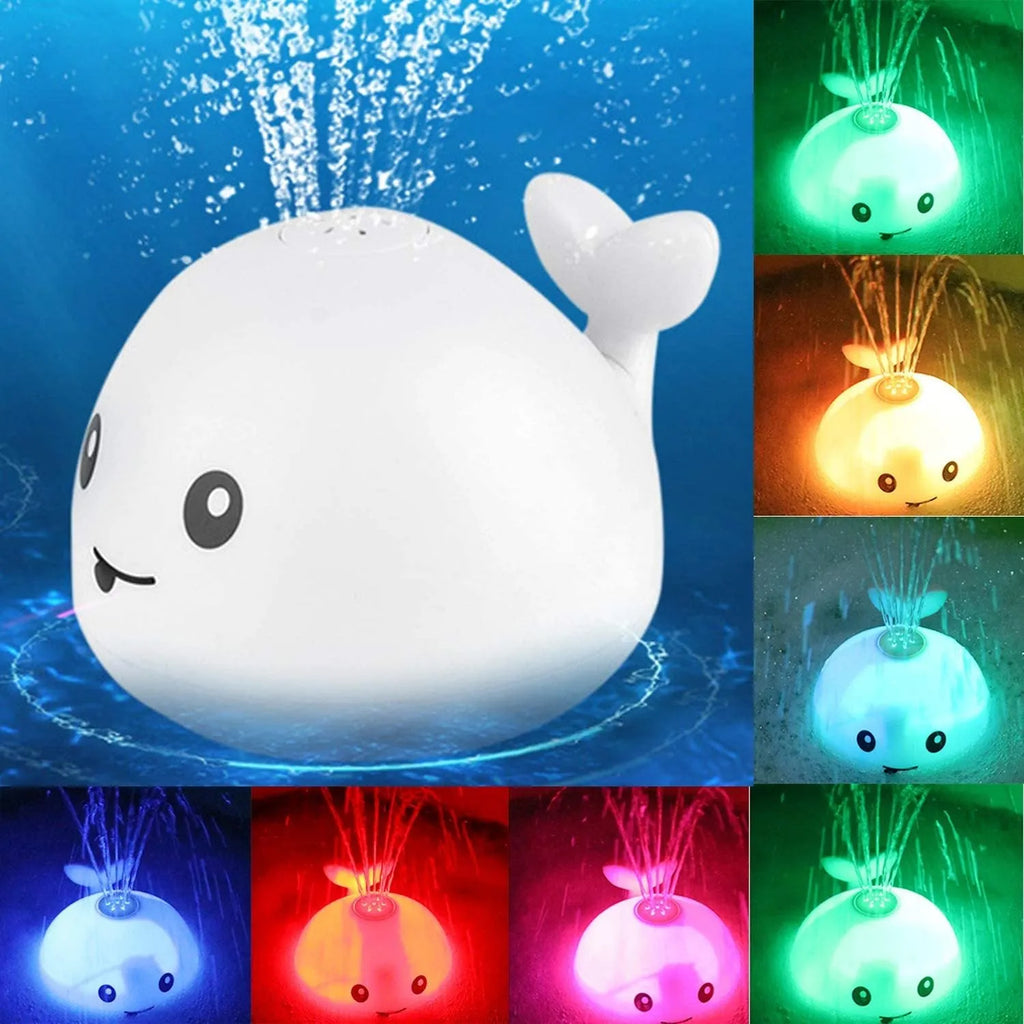Electric whale-shaped baby bath toy with water spray, LED lights, and automatic water sensor