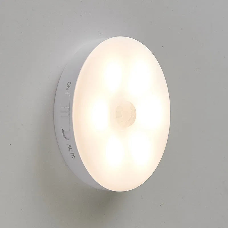 Wireless motion sensor LED light for automatic nighttime illumination in hallways and cabinets