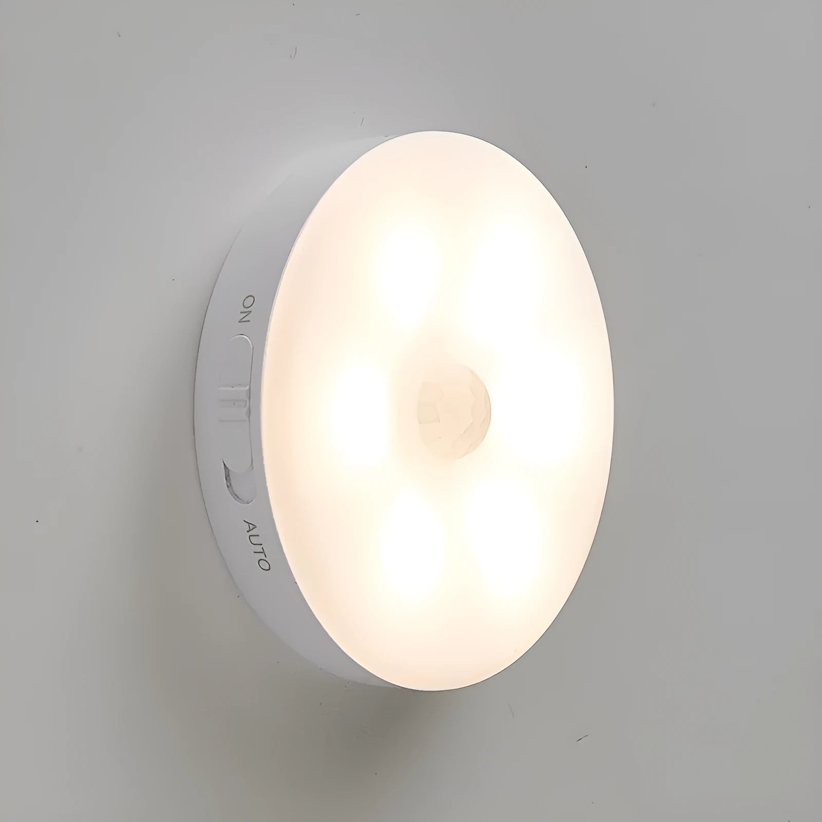 Wireless motion sensor LED light for automatic nighttime illumination in hallways and cabinets