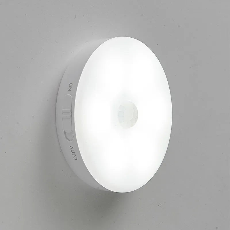 Wireless motion sensor LED light for automatic nighttime illumination in hallways and cabinets