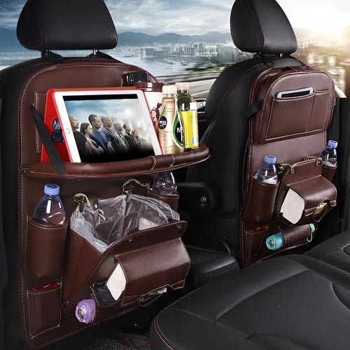 PU leather car storage hanging bag with multiple pockets and built-in trash can mounted on car seat