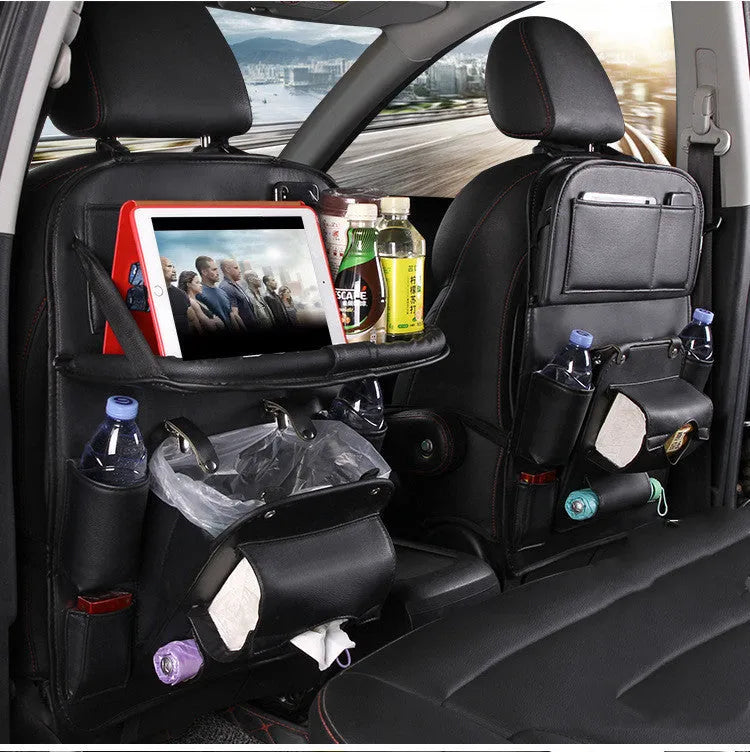 PU leather car storage hanging bag with multiple pockets and built-in trash can mounted on car seat