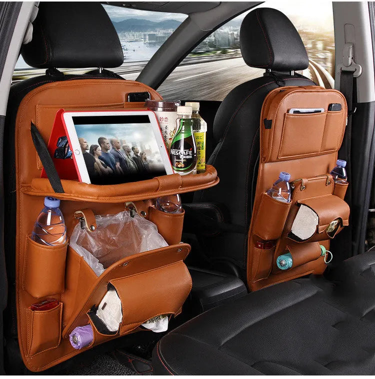 PU leather car storage hanging bag with multiple pockets and built-in trash can mounted on car seat