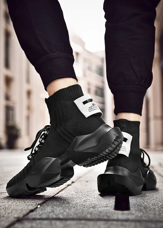 Men's black and white casual sports shoes with mesh lining available in sizes 39-47 UK