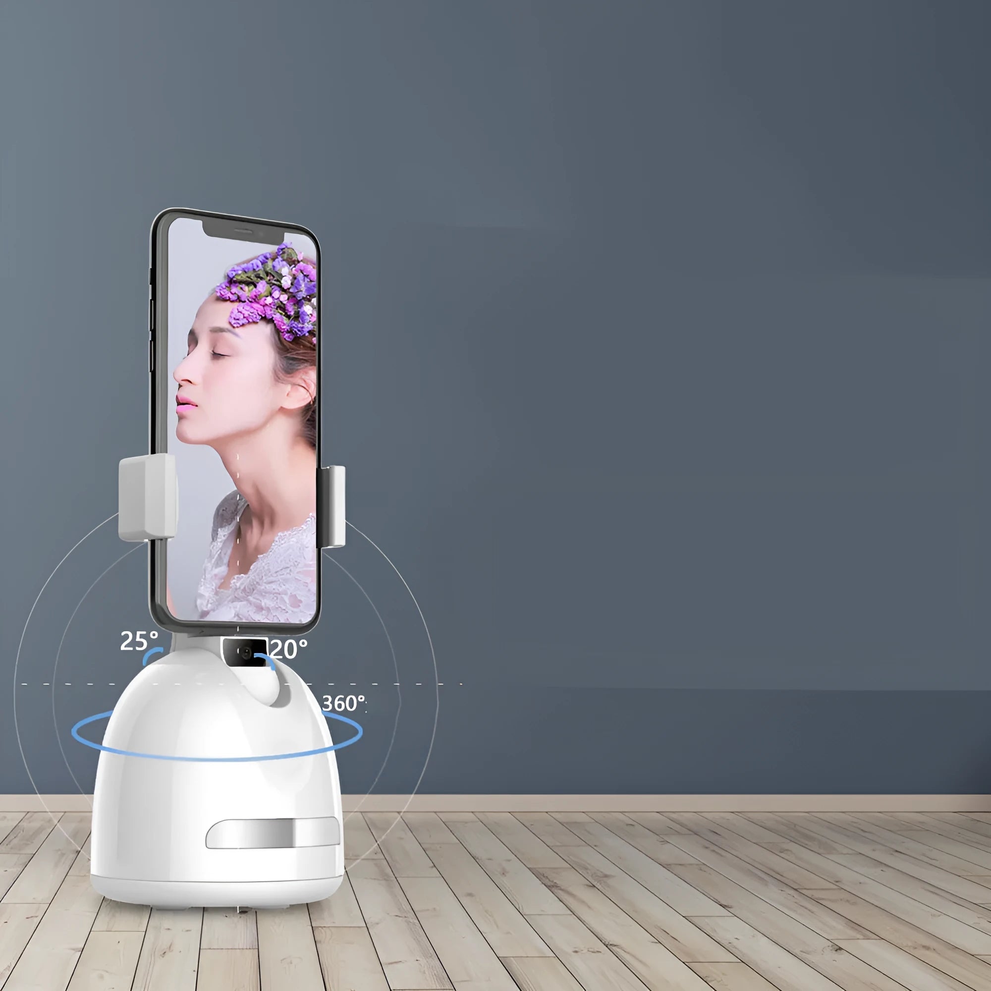 Smartphone face tracking camera mount with fill light on a desk for indoor vlogging