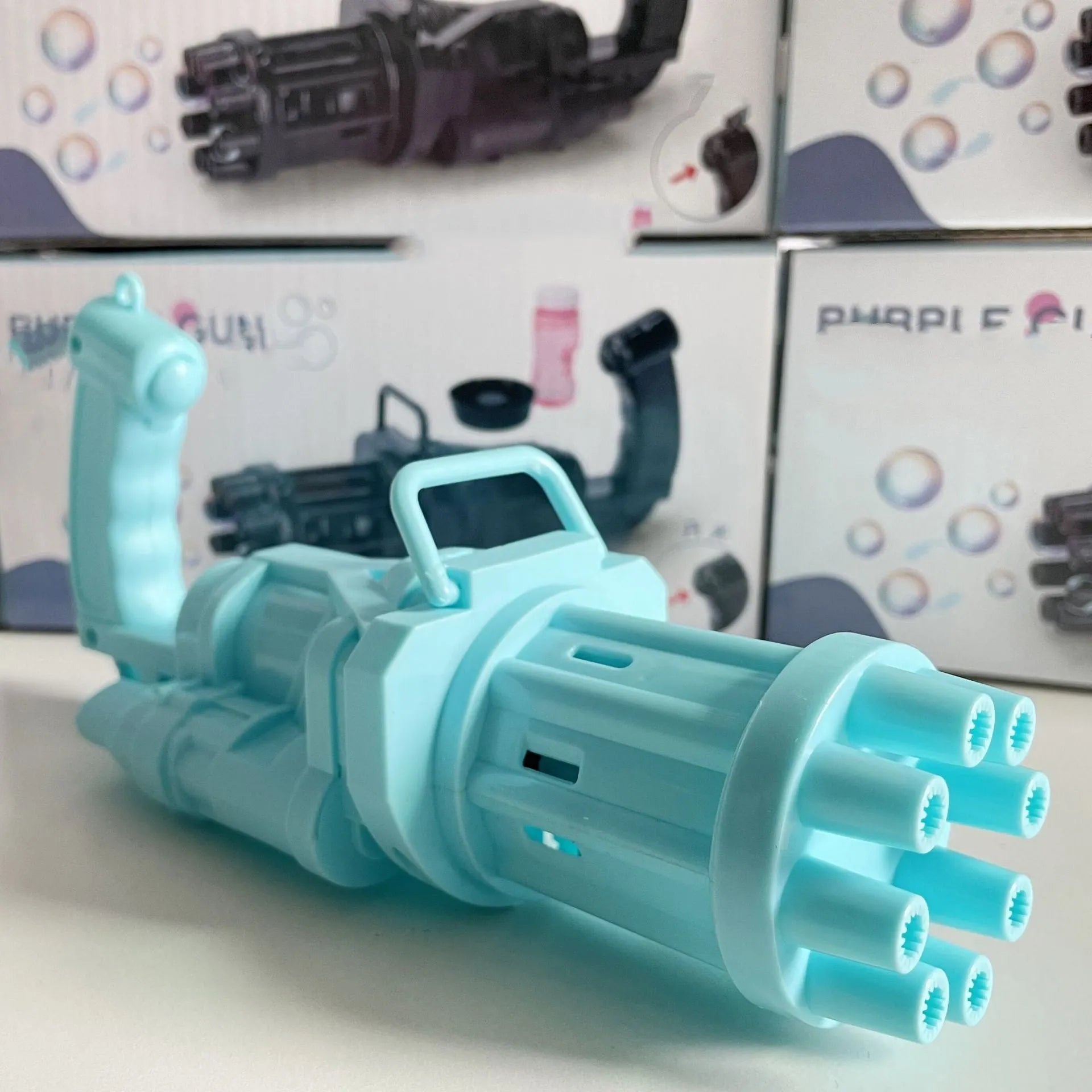 Kids bubble machine gun toy in pink, gold, or black colours with trigger and removable bubblehead.