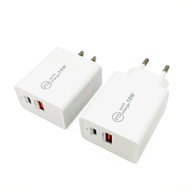 White 18W USB-C PD fast wall charger with US plug on a wooden surface.