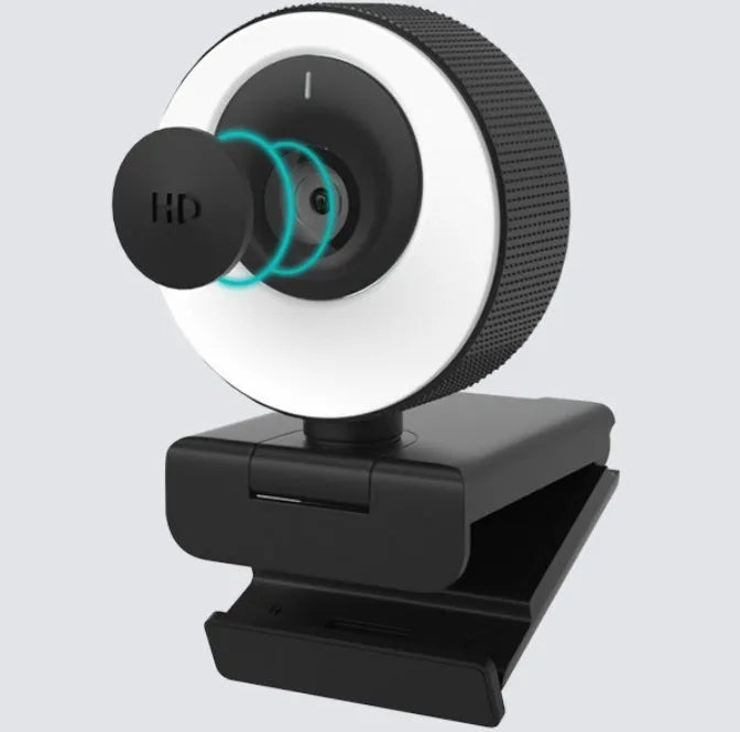 Black Full HD USB webcam with built-in microphone and magnetic privacy cover on a desk.