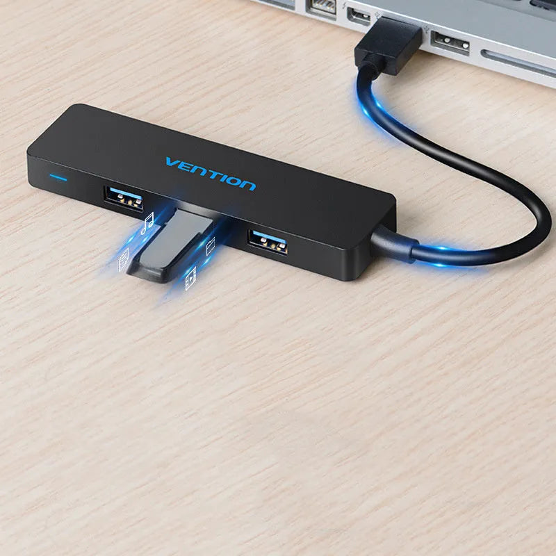 Black four-port USB 3.0 hub expansion device with 0.15 metre cable