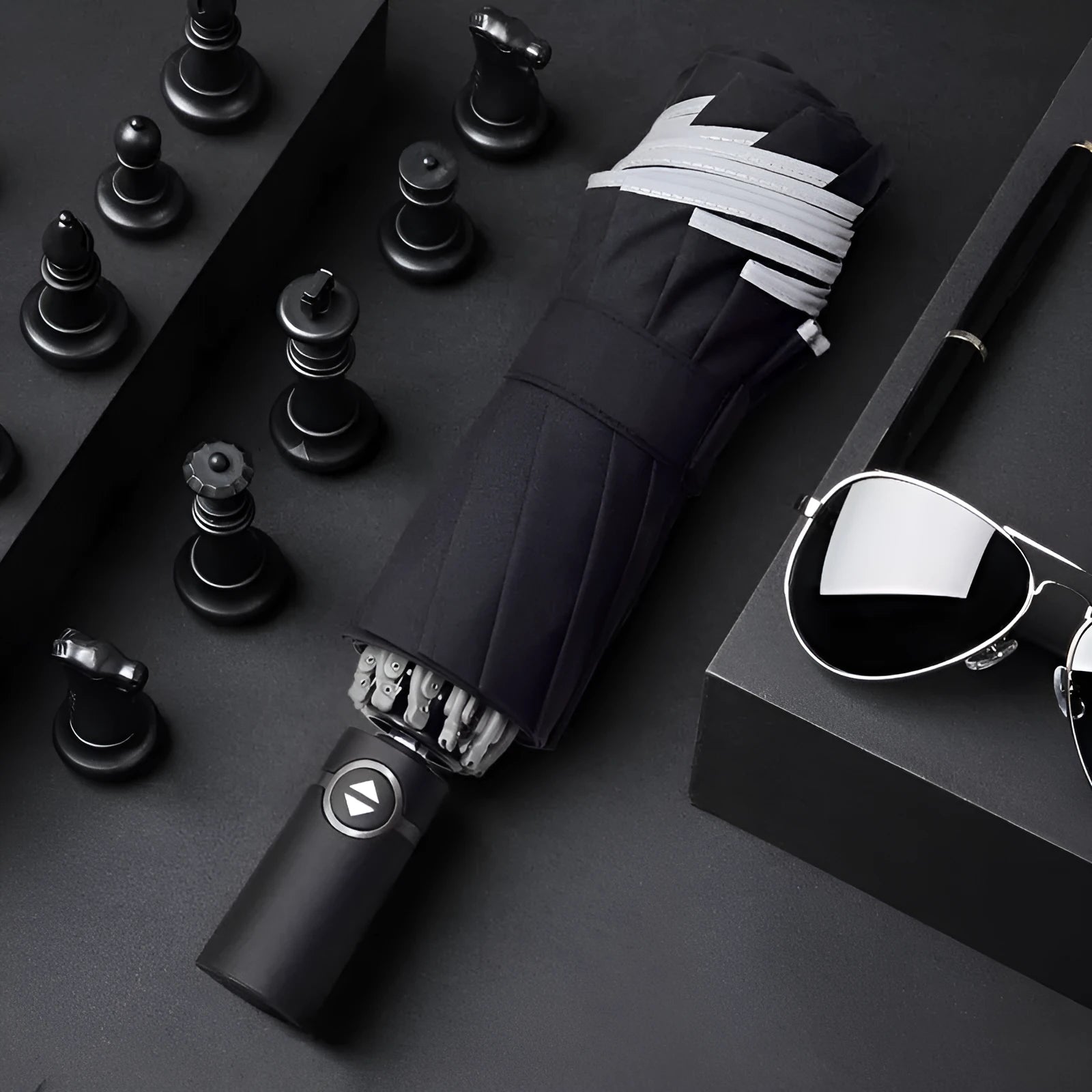 Black full automatic reverse umbrella open, showing 10-bone structure and plastic non-slip handle.