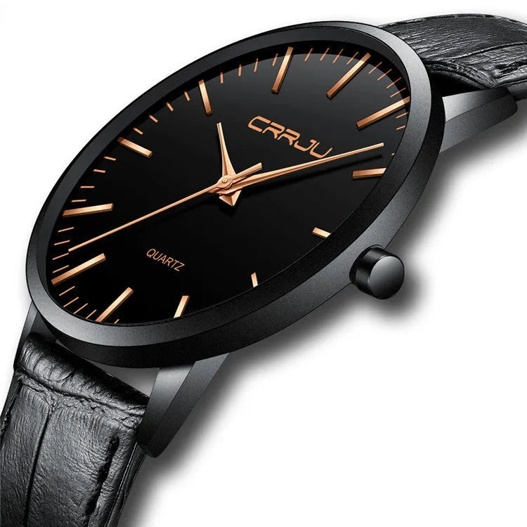 Quartz watch with alloy case and mesh strap showing black face with gold hands